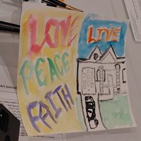 Layered art journal page with paint, stenciled shapes, and a small affirmation card.